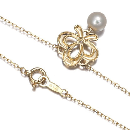 Mikimoto necklace with 5.7mm pearl and diamond set in 18 karat yellow gold with 39 cm chain