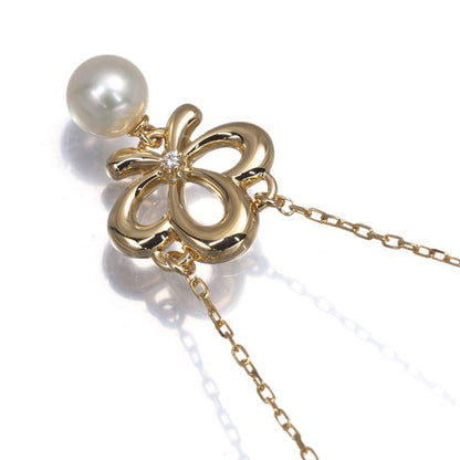 Mikimoto necklace with 5.7mm pearl and diamond set in 18 karat yellow gold with 39 cm chain
