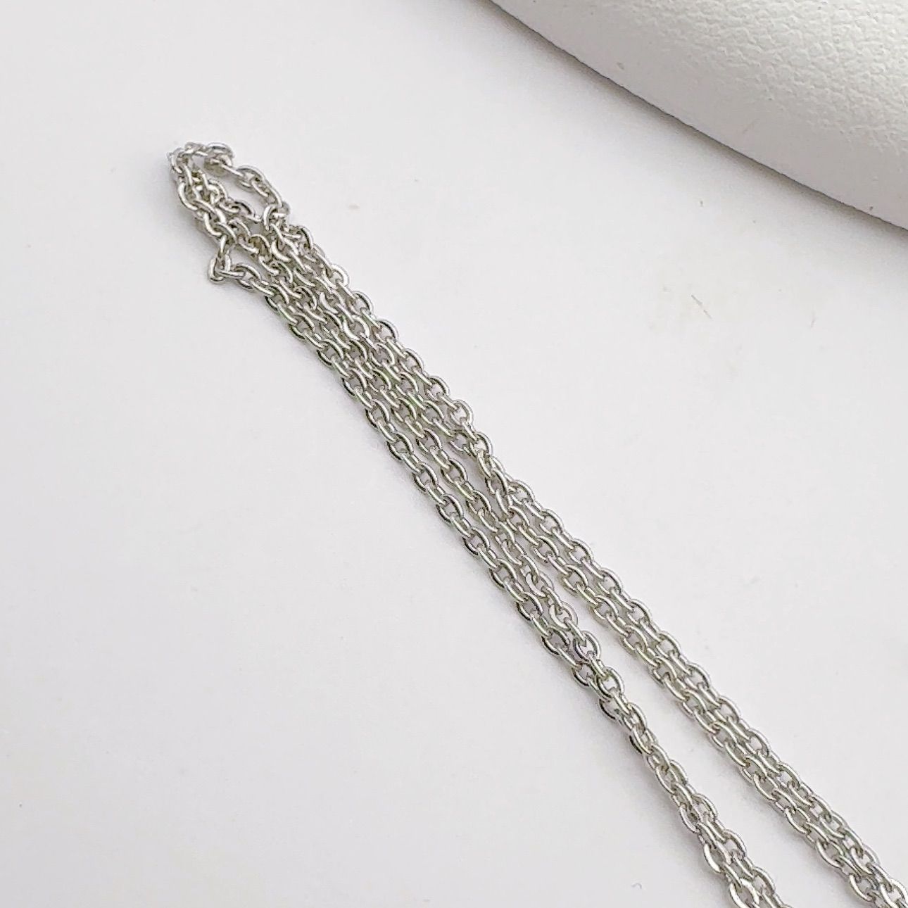 Mikimoto grape motif necklace in silver tone featuring a 5mm pearl and 45cm silver chain