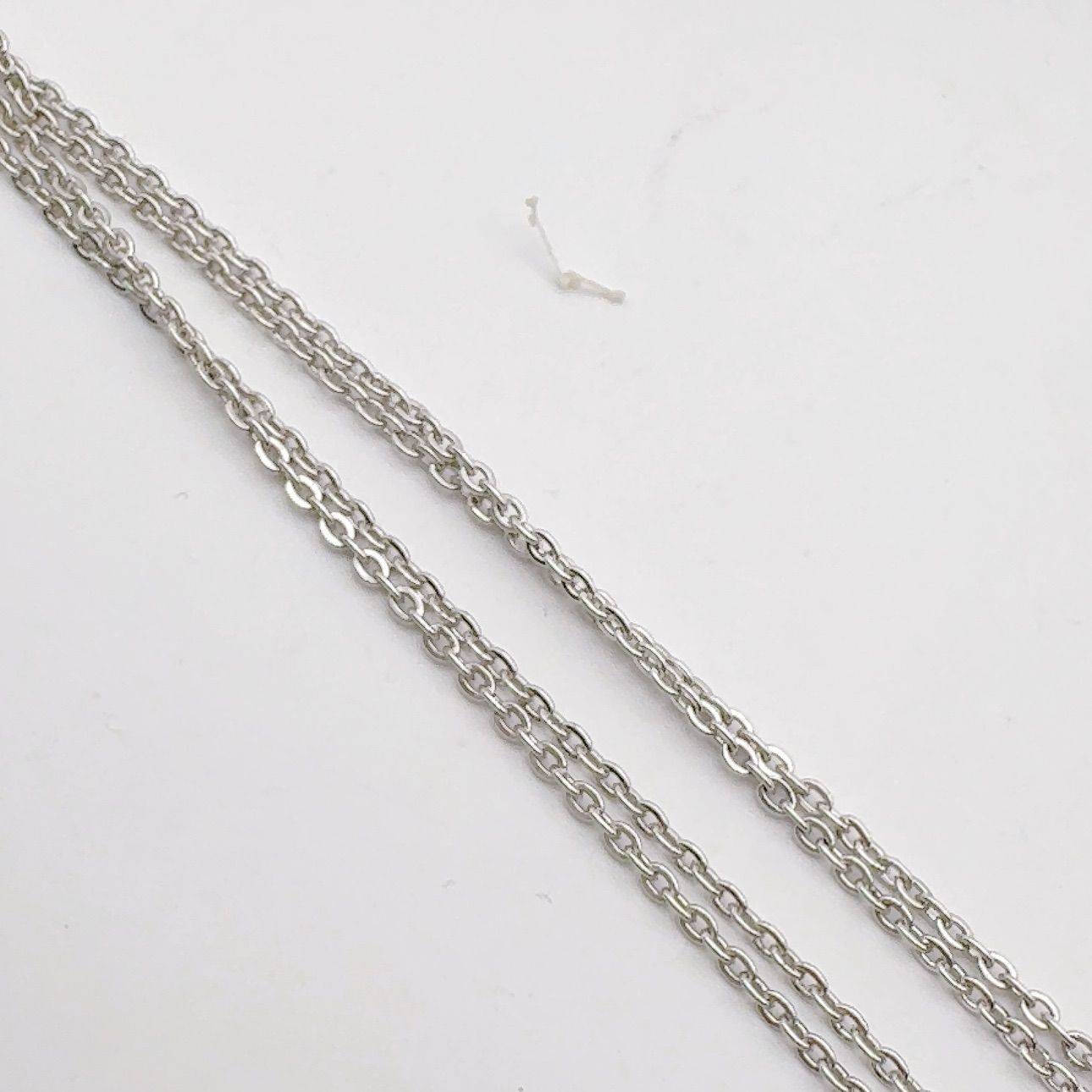 Mikimoto grape motif necklace in silver tone featuring a 5mm pearl and 45cm silver chain