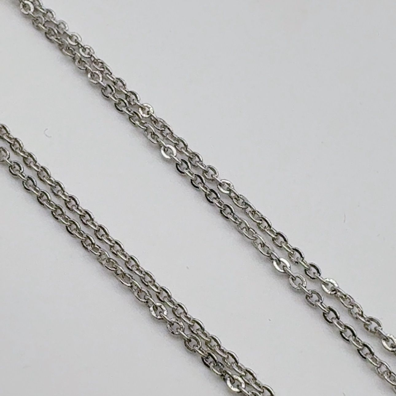 Mikimoto Necklace featuring a 5mm pearl on a 40cm chain with 4.5cm height and 1.6cm width pendant