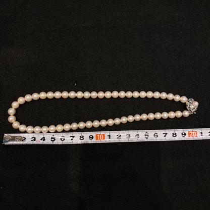 Honma Akoya Pearl Necklace with 7.9mm bright glossy pearls set in K14 white gold with engraved design