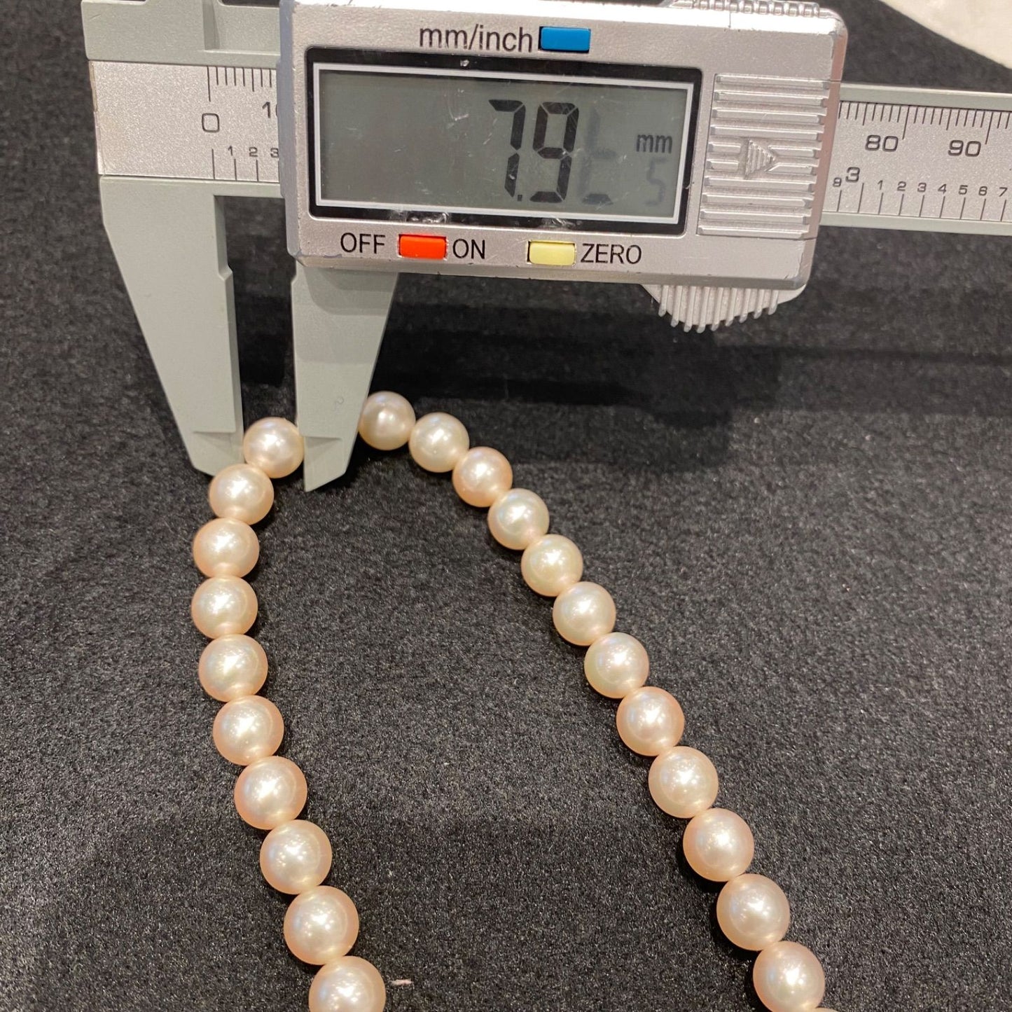 Honma Akoya Pearl Necklace with 7.9mm bright glossy pearls set in K14 white gold with engraved design