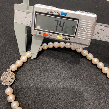 Honma Akoya Pearl Necklace with 7.9mm bright glossy pearls set in K14 white gold with engraved design