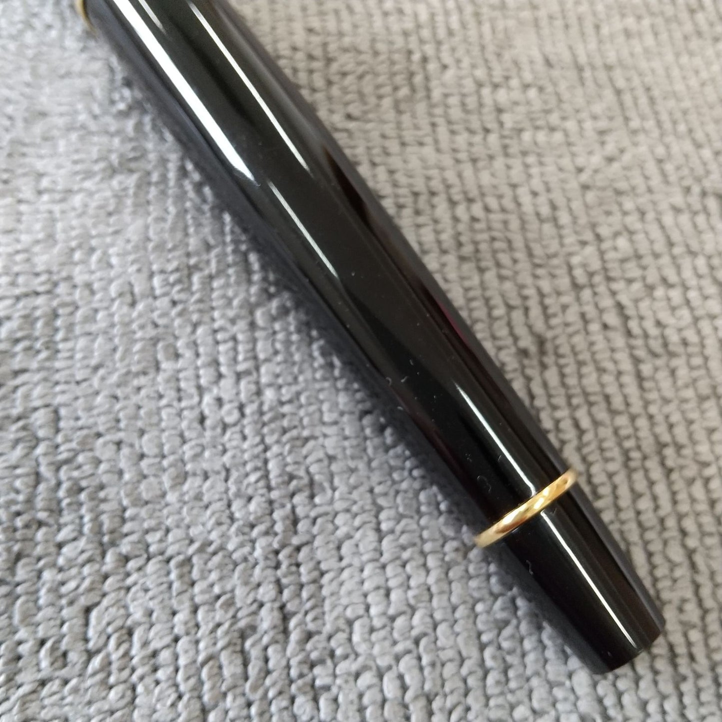 Used Waterman ballpoint pen and fountain pen set showing aged wear and ink residue