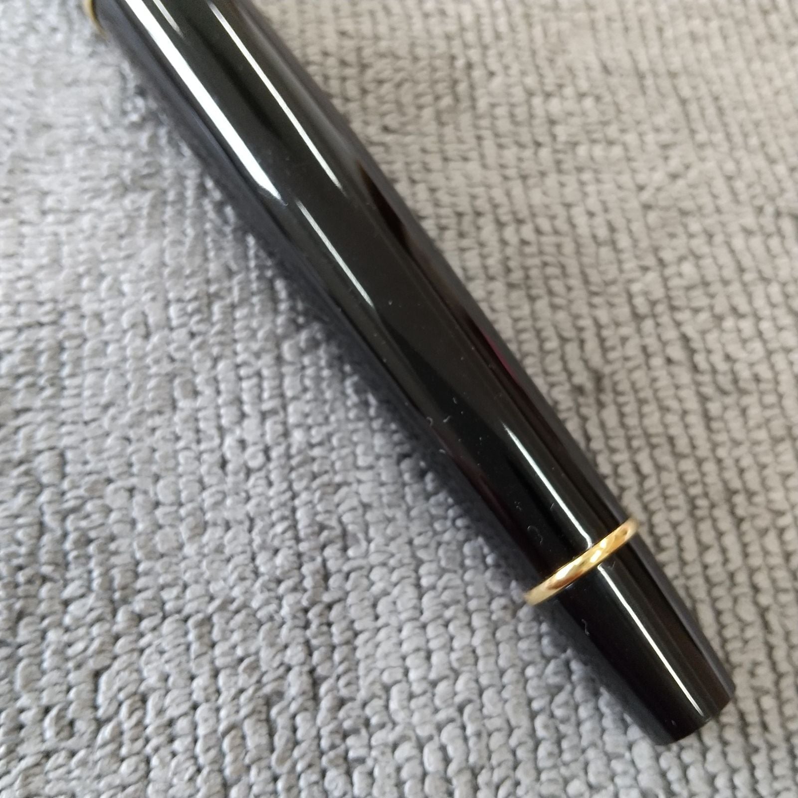 Used Waterman ballpoint pen and fountain pen set showing aged wear and ink residue