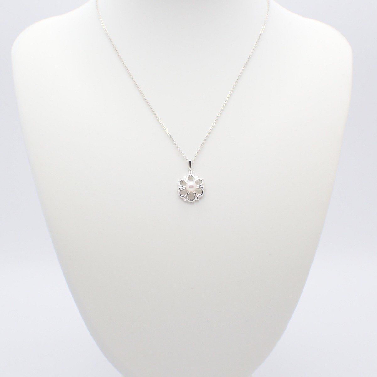 Mikimoto Flower Necklace featuring silver chain with delicate pearl flower pendant