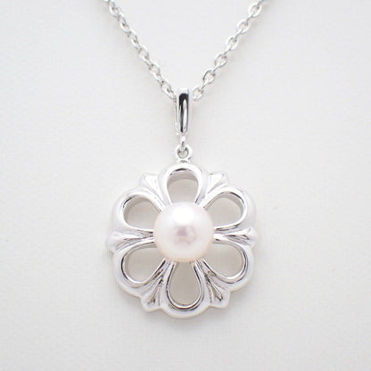Mikimoto Flower Necklace featuring silver chain with delicate pearl flower pendant