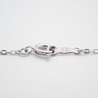 Mikimoto silver cross necklace featuring four small pearls and adjustable chain