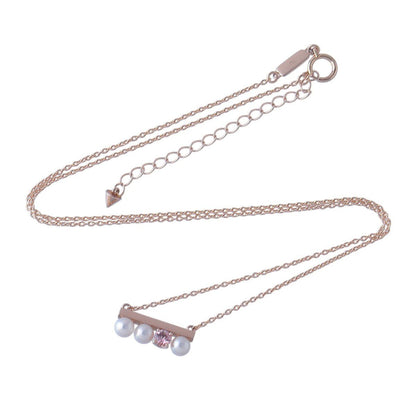 Tasaki Petit Balance Solo Necklace with 3 Akoya pearls and pink sapphire pendant on 45cm gold chain