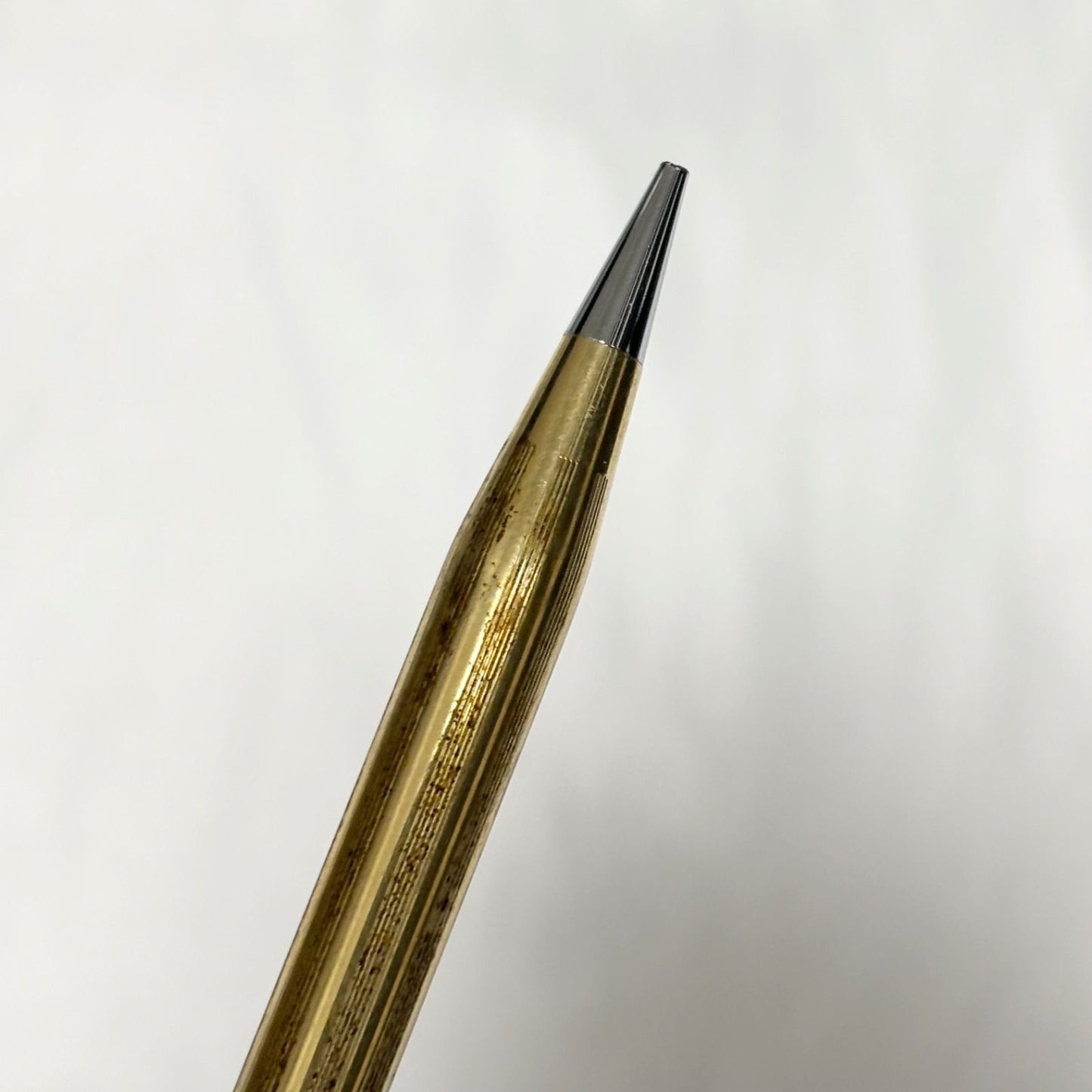 Gold Cross Century Classic mechanical pencil with minor scratches and dents shown