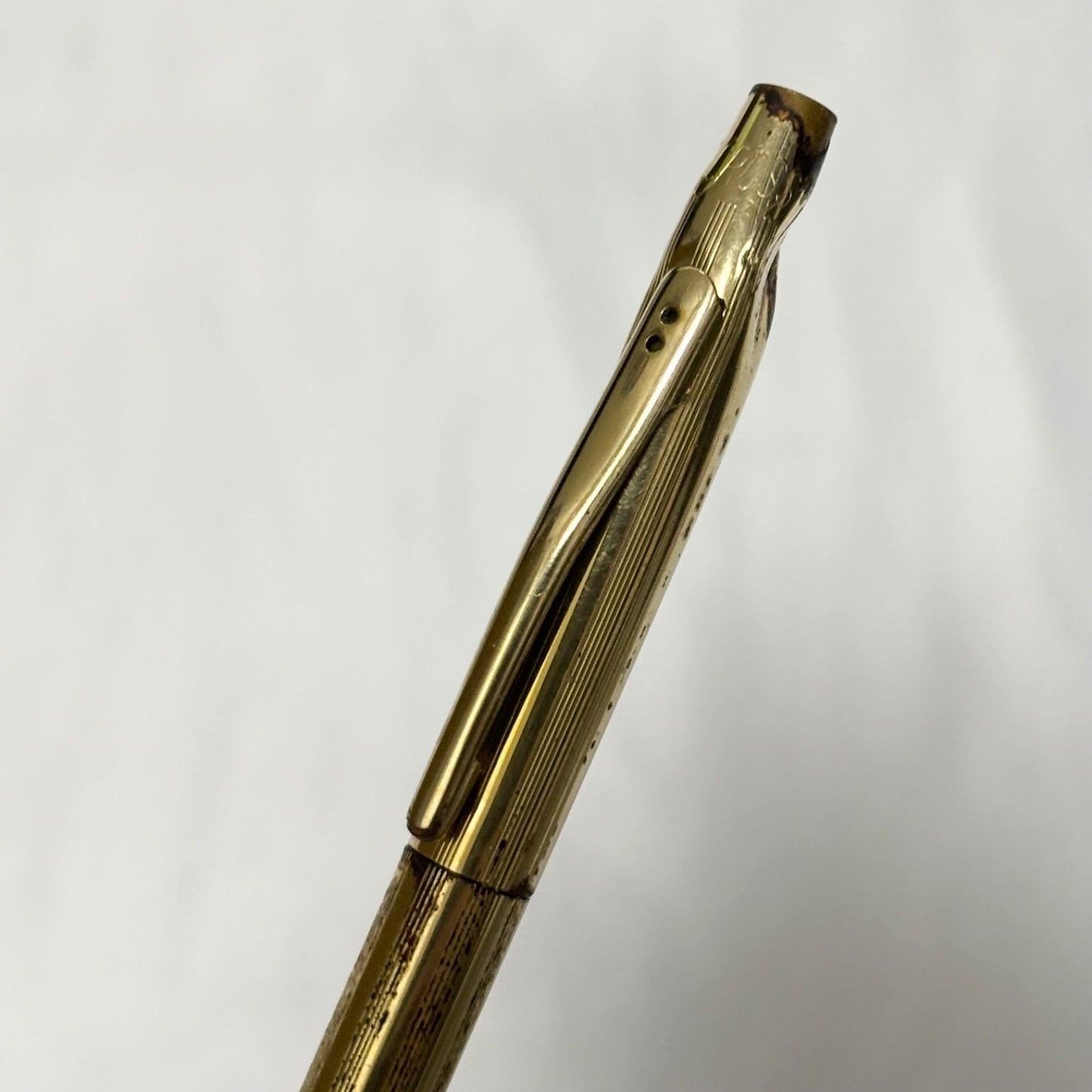 Gold Cross Century Classic mechanical pencil with minor scratches and dents shown