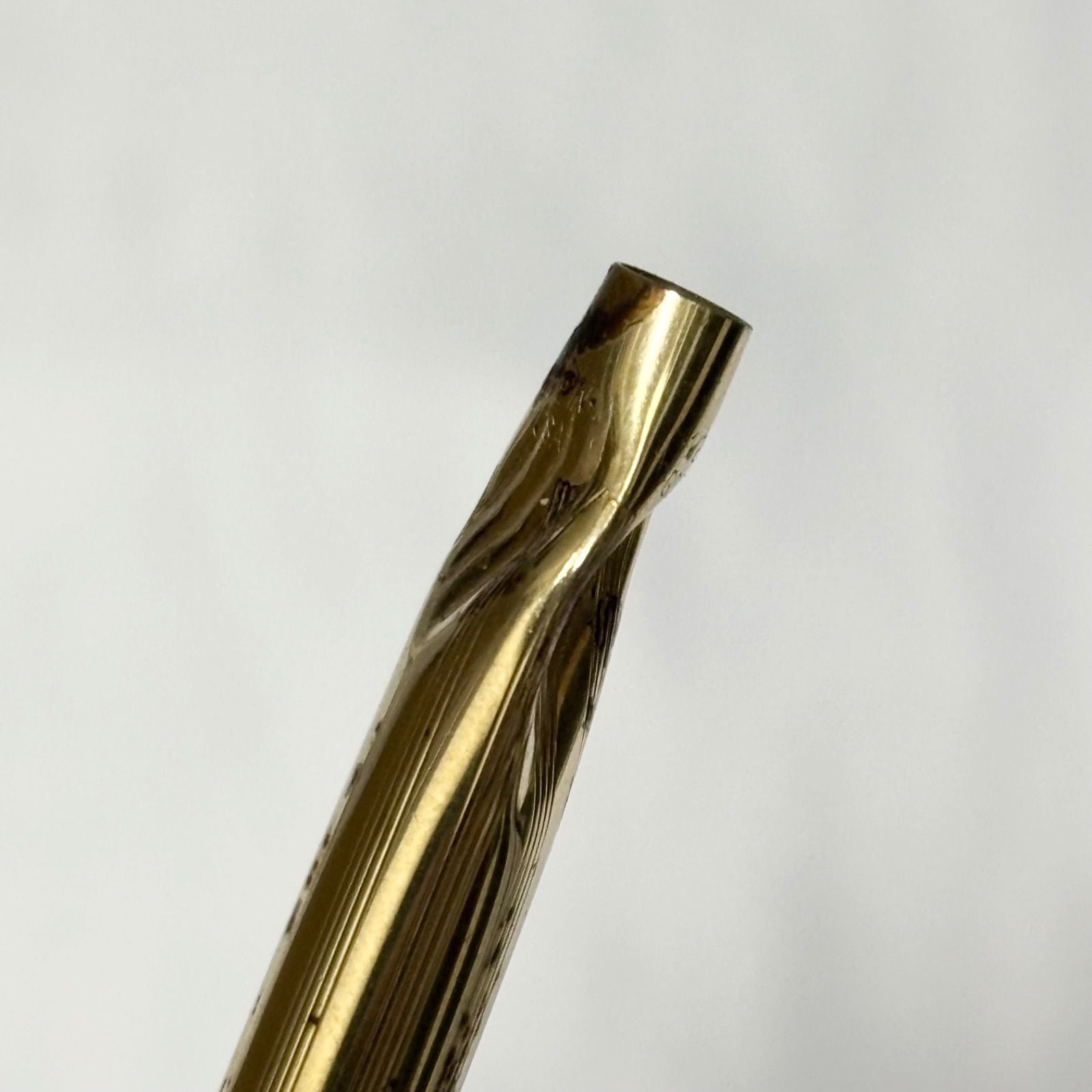 Gold Cross Century Classic mechanical pencil with minor scratches and dents shown