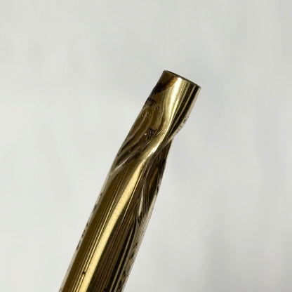 Gold Cross Century Classic mechanical pencil with minor scratches and dents shown