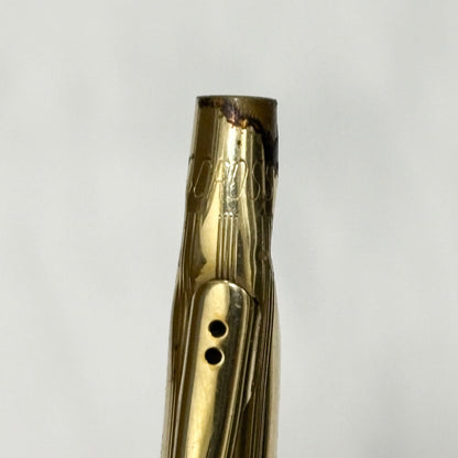 Gold Cross Century Classic mechanical pencil with minor scratches and dents shown