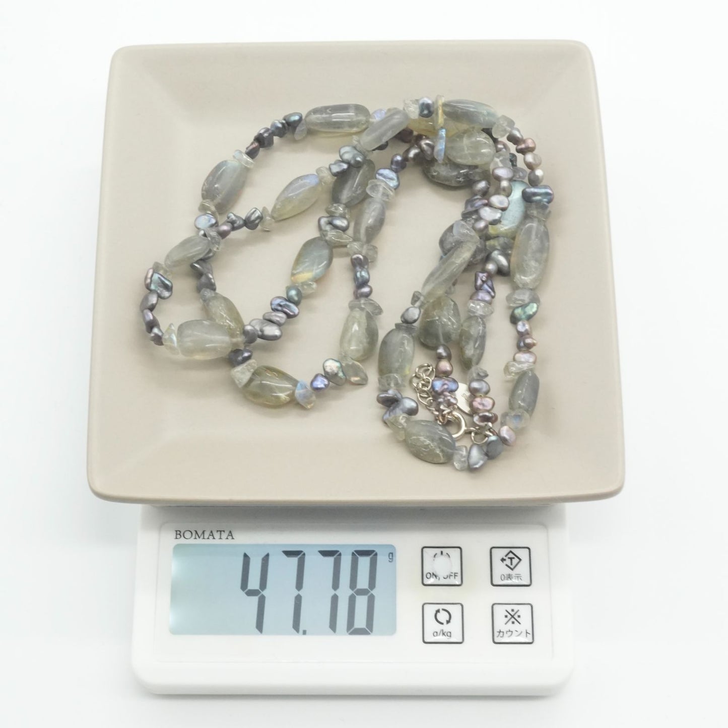 Agete long necklace made of silver with lapis lazuli and shell beads