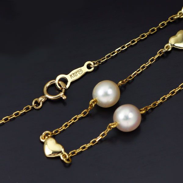 Mikimoto K18YG Akoya Pearl Necklace with 41 cm gold chain and single round white pearl pendant