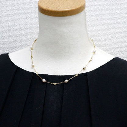 Mikimoto K18YG Akoya Pearl Necklace with 41 cm gold chain and single round white pearl pendant