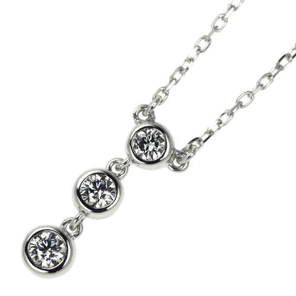 Mikimoto 18K white gold pendant necklace with three diamonds totaling 0.33 carats on a 40 cm chain