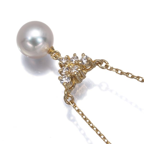 Mikimoto necklace featuring a 7.6mm Akoya pearl pendant with diamond accents set in 18K yellow gold on a 39cm chain