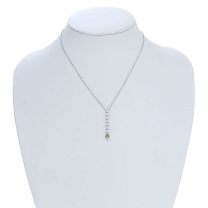 Mikimoto white gold diamond necklace with 7 round cut and 1 square cut diamonds, 40 cm length