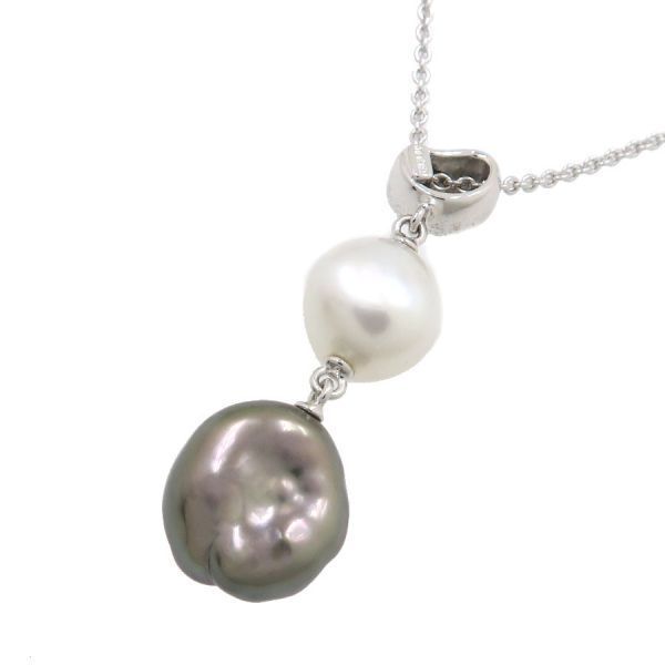 Mikimoto Baroque Pearl Necklace in white gold with white and kuro pearls featuring butterfly motif