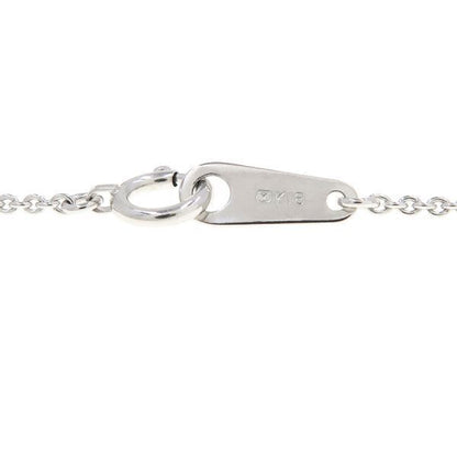 Mikimoto Baroque Pearl Necklace in white gold with white and kuro pearls featuring butterfly motif