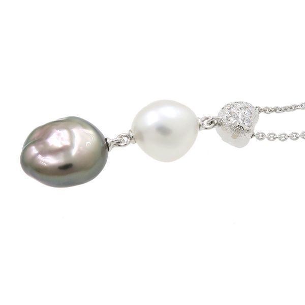 Mikimoto Baroque Pearl Necklace in white gold with white and kuro pearls featuring butterfly motif