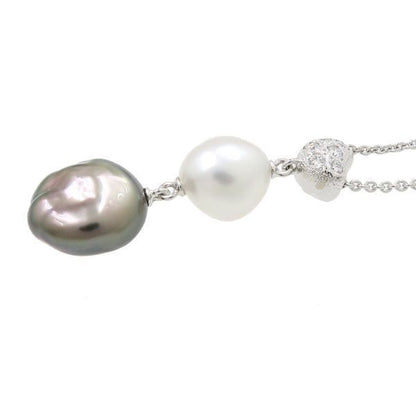 Mikimoto Baroque Pearl Necklace in white gold with white and kuro pearls featuring butterfly motif