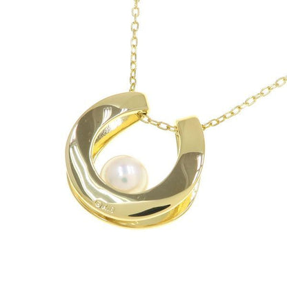 Mikimoto Akoya pearl necklace with 6.8mm pearls, 39cm length, classic round pearls on a white background