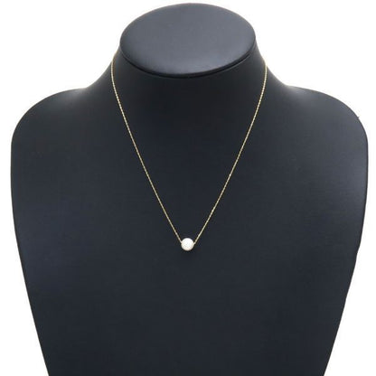 Tasaki Akoya pearl necklace with 7.6mm pearls, 38-41.5cm length, displayed on white background