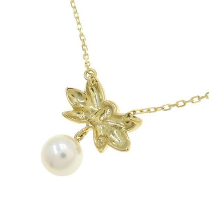 Mikimoto Akoya pearl diamond necklace in yellow gold with 7.0mm pearl, 39cm length, displayed on white background