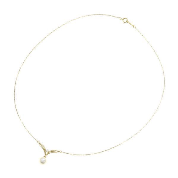 Mikimoto Acoya pearl diamond necklace with 7mm pearls and diamond pendant measuring 19.3mm by 20.5mm