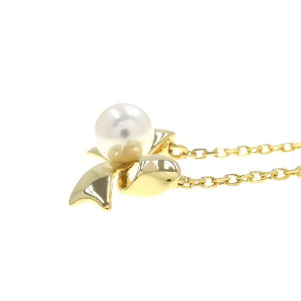 Mikimoto Akoya pearl necklace in 18k yellow gold with 5.1mm pearls and ribbon design, 39.5 cm length