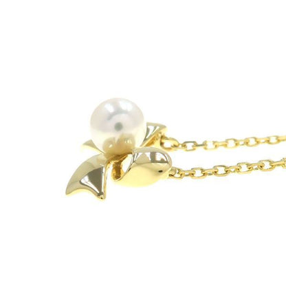 Mikimoto Akoya pearl necklace in 18k yellow gold with 5.1mm pearls and ribbon design, 39.5 cm length