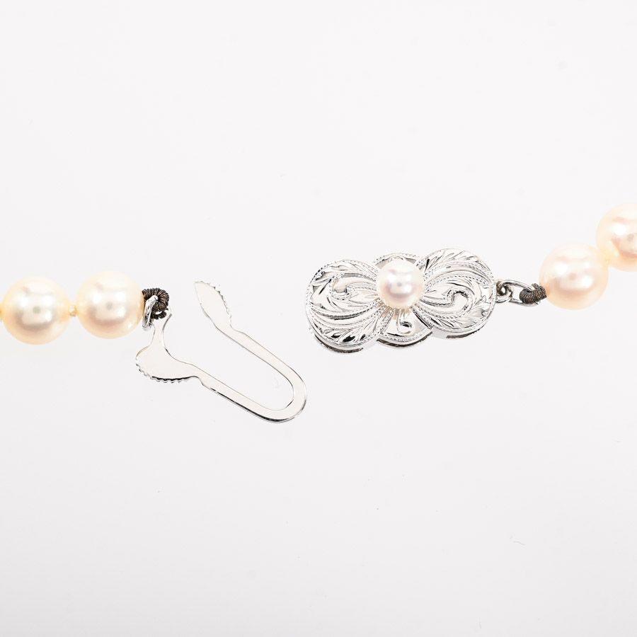 Mikimoto pearl necklace featuring 5.5-6mm pearls on a 38.5cm silver chain