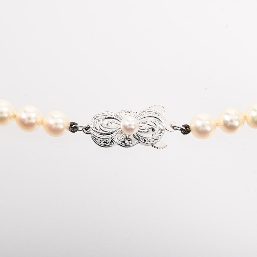 Mikimoto pearl necklace featuring 5.5-6mm pearls on a 38.5cm silver chain