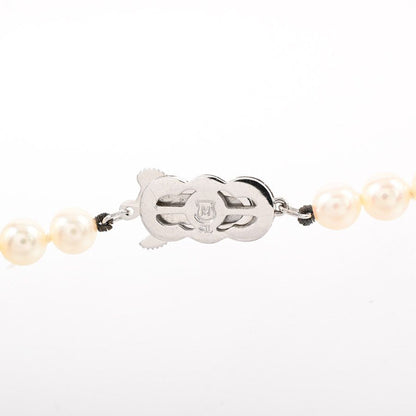 Mikimoto pearl necklace featuring 5.5-6mm pearls on a 38.5cm silver chain