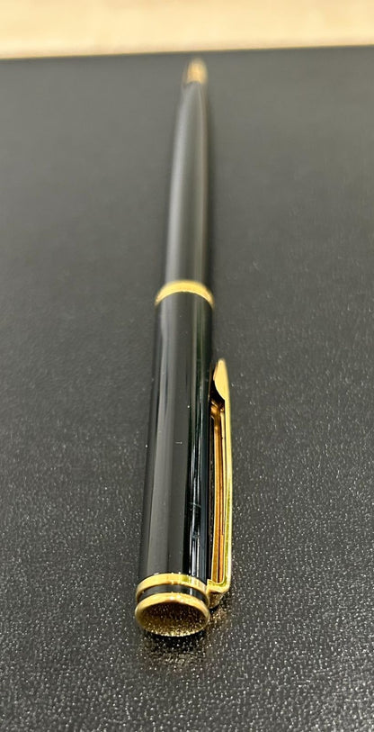 Used Waterman ballpoint pen with click mechanism needing future ink replacement