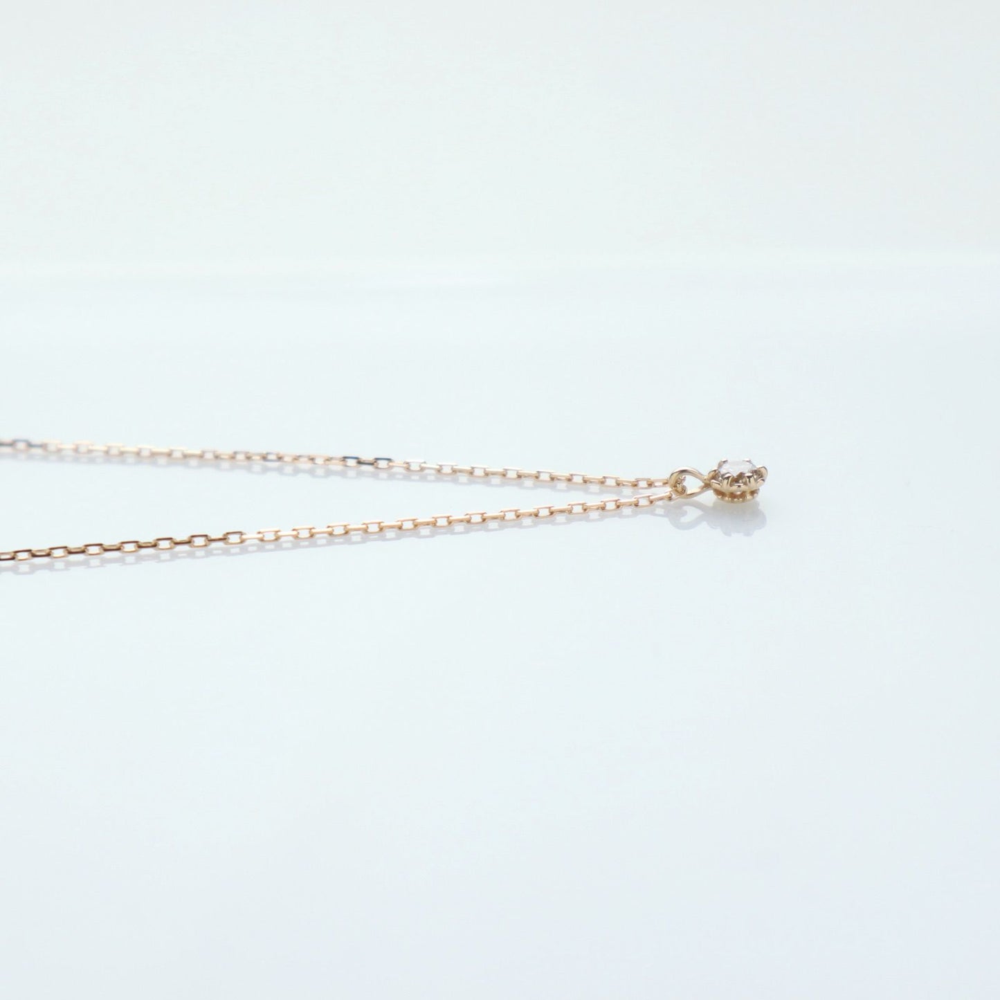Agete K18 yellow gold necklace with 0.05ct diamond charm measuring 0.3 cm square and 38cm chain length