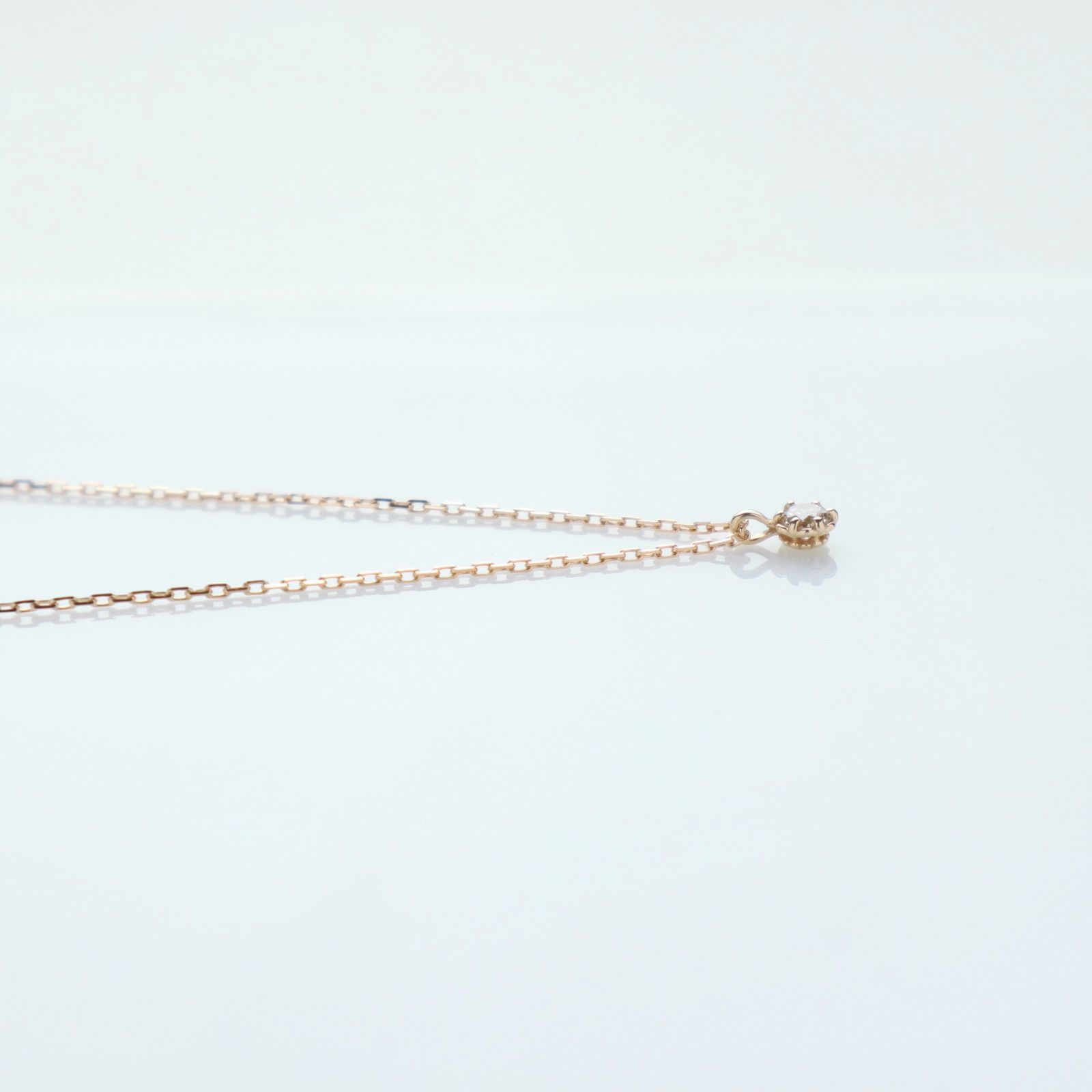 Agete K18 yellow gold necklace with 0.05ct diamond charm measuring 0.3 cm square and 38cm chain length
