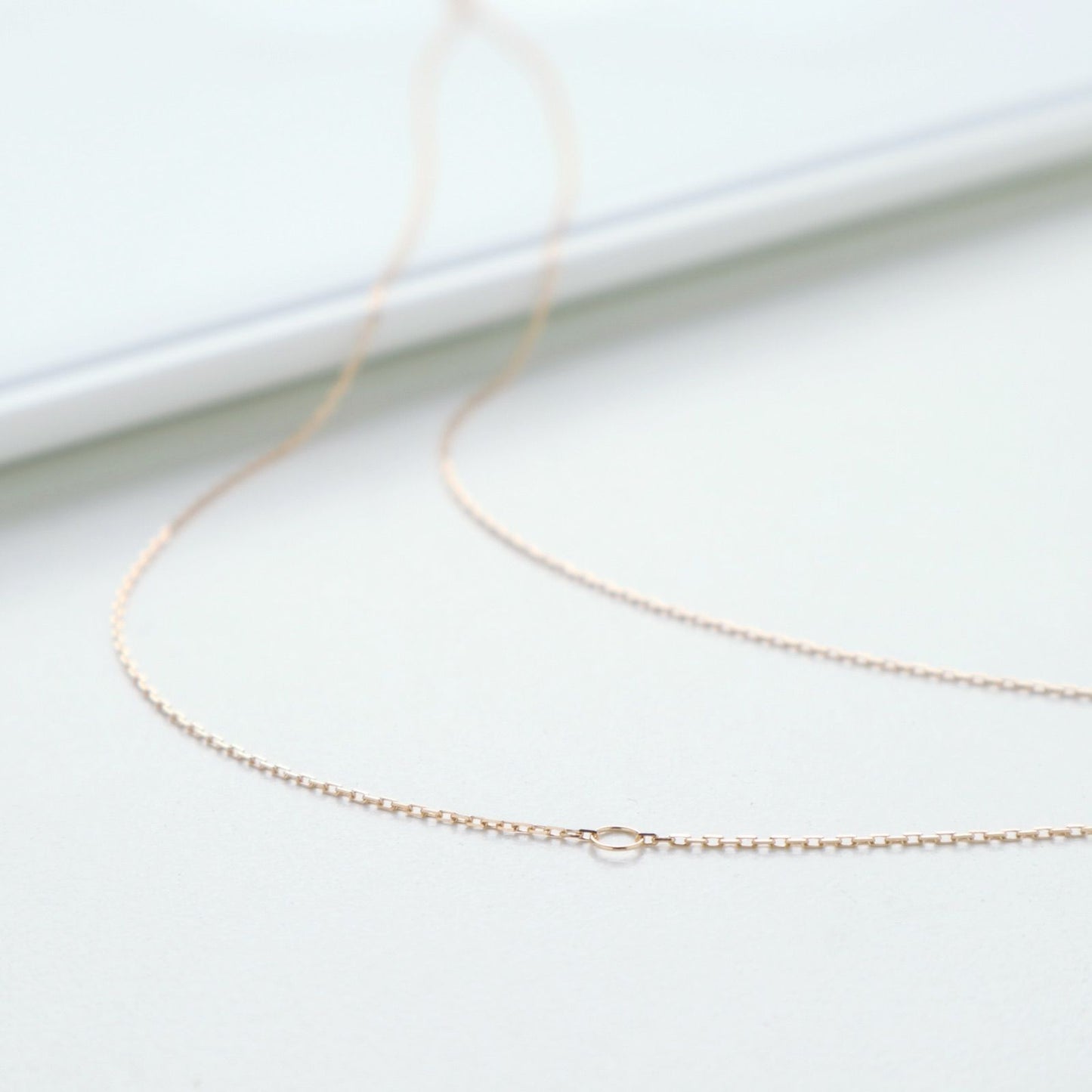 Agete K18 yellow gold necklace with 0.05ct diamond charm measuring 0.3 cm square and 38cm chain length