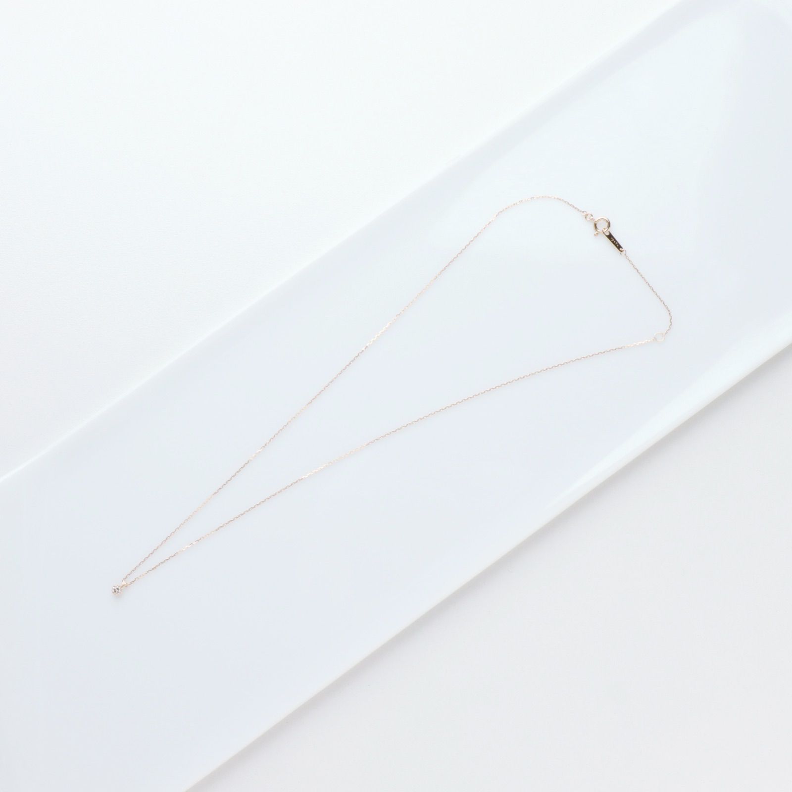 Agete K18 yellow gold necklace with 0.05ct diamond charm measuring 0.3 cm square and 38cm chain length