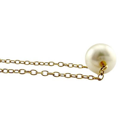 Mikimoto 18K yellow gold ladies necklace featuring a single pearl pendant