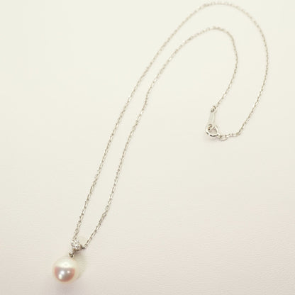 Mikimoto K18WG white gold pendant necklace with pearl and solitaire diamond on a chain