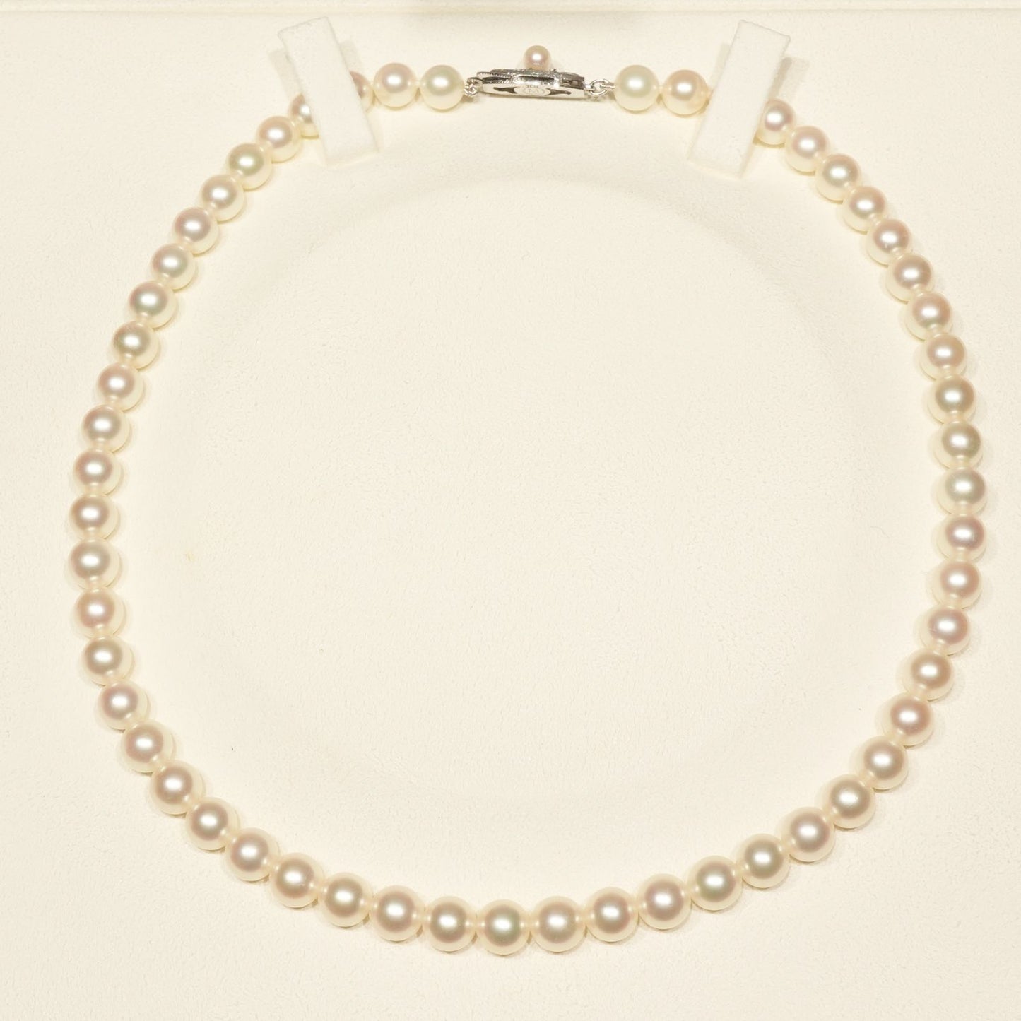 Mikimoto K14WG Akoya Pearl Necklace featuring white pearls sized 6.6 to 6.9 mm on a sterling white gold chain