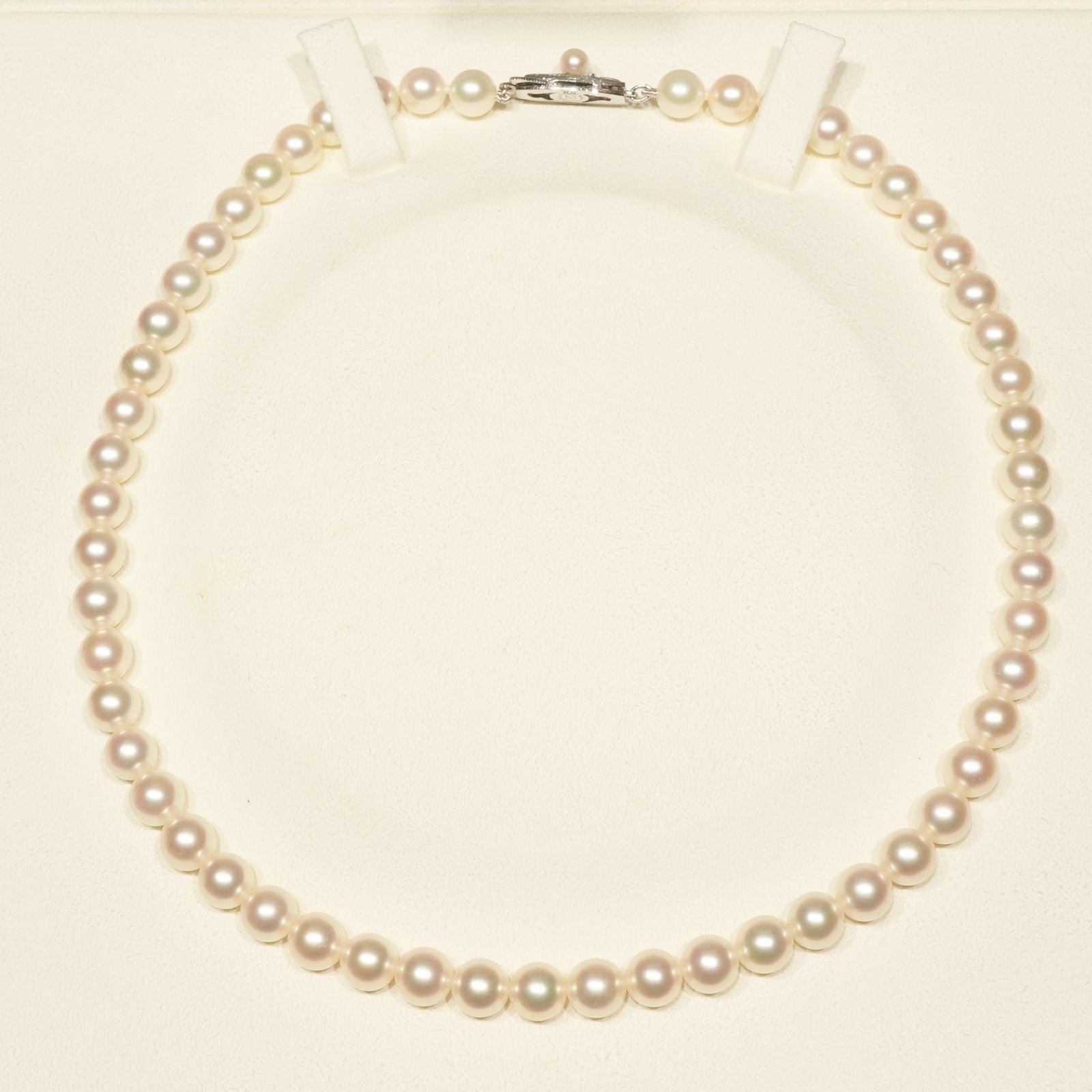 Mikimoto K14WG Akoya Pearl Necklace featuring white pearls sized 6.6 to 6.9 mm on a sterling white gold chain