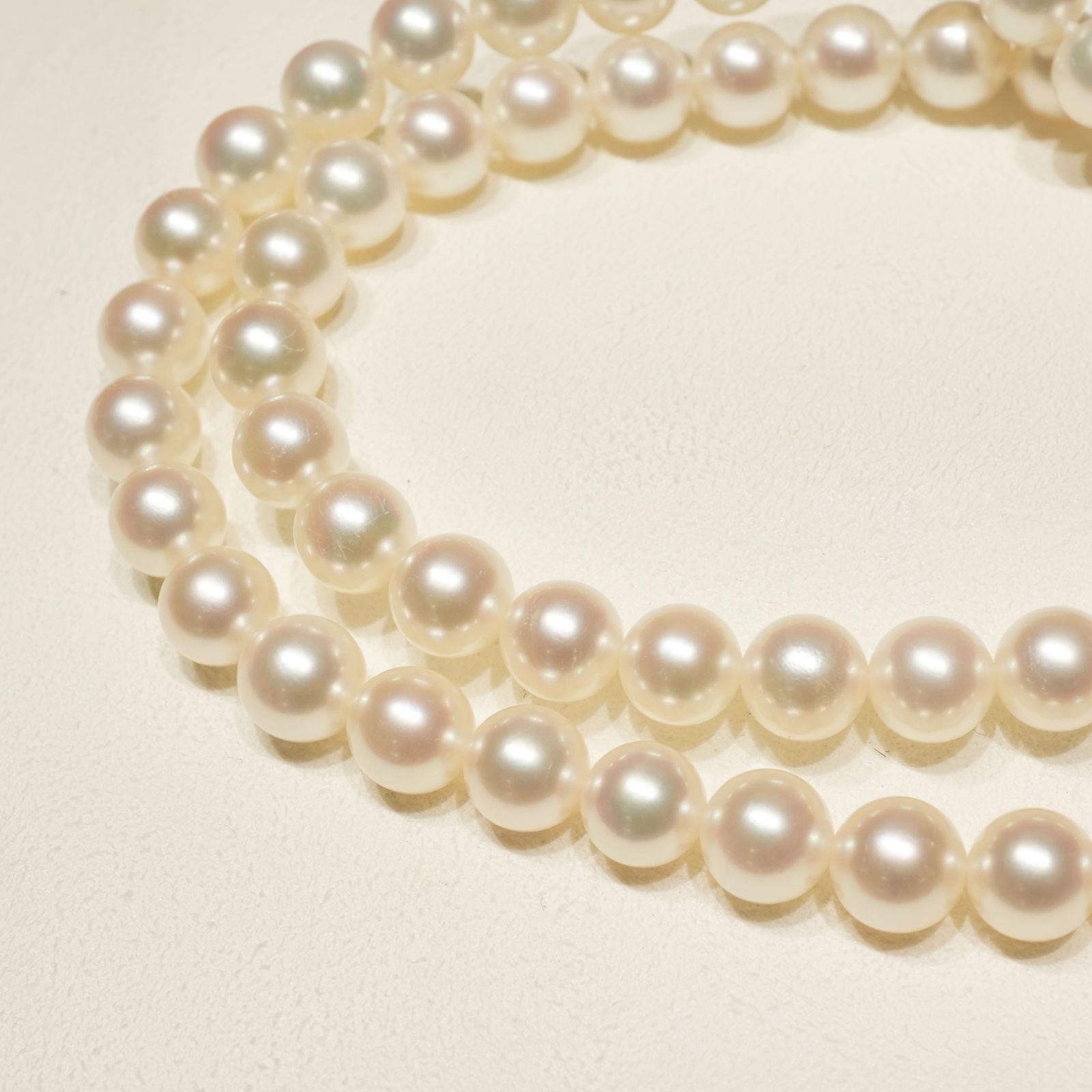 Mikimoto K14WG Akoya Pearl Necklace featuring white pearls sized 6.6 to 6.9 mm on a sterling white gold chain