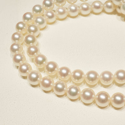 Mikimoto K14WG Akoya Pearl Necklace featuring white pearls sized 6.6 to 6.9 mm on a sterling white gold chain