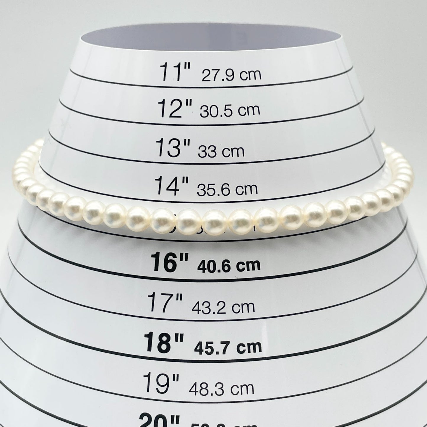 Mikimoto K14WG Akoya Pearl Necklace featuring white pearls sized 6.6 to 6.9 mm on a sterling white gold chain